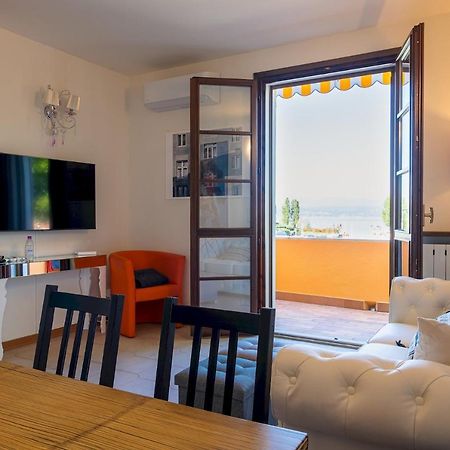 Апартаменты La Casa Sul Porto - Italian Homing Сирмионе Экстерьер фото