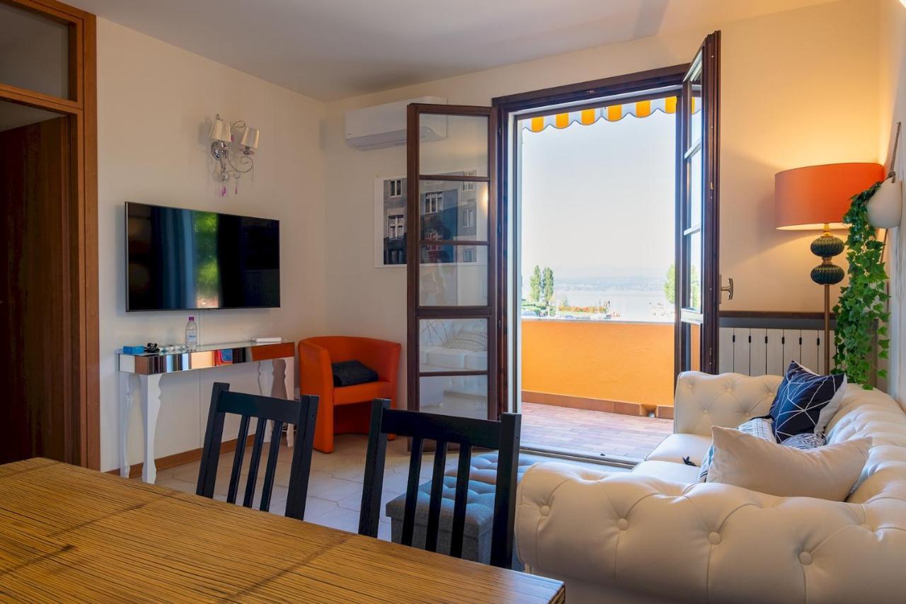 Апартаменты La Casa Sul Porto - Italian Homing Сирмионе Экстерьер фото