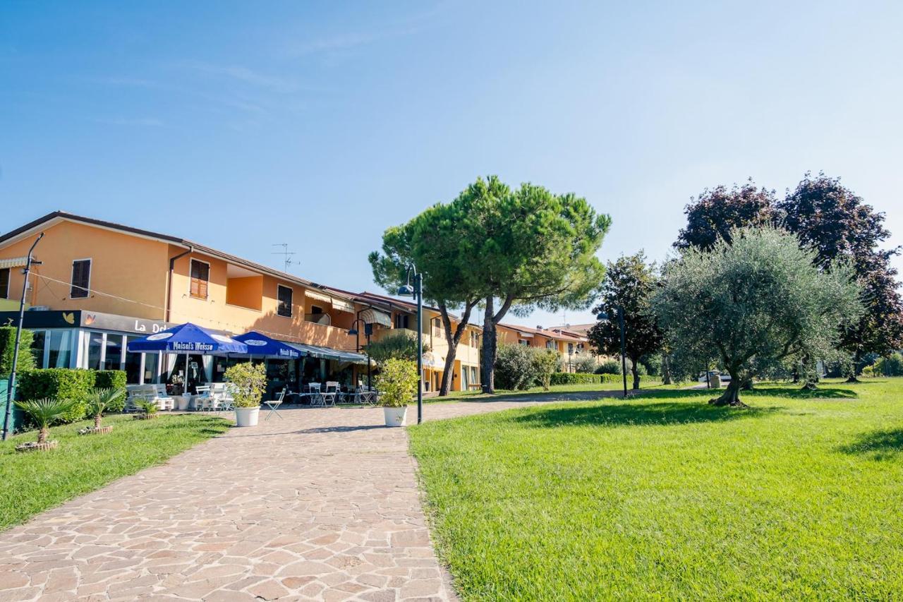 Апартаменты La Casa Sul Porto - Italian Homing Сирмионе Экстерьер фото